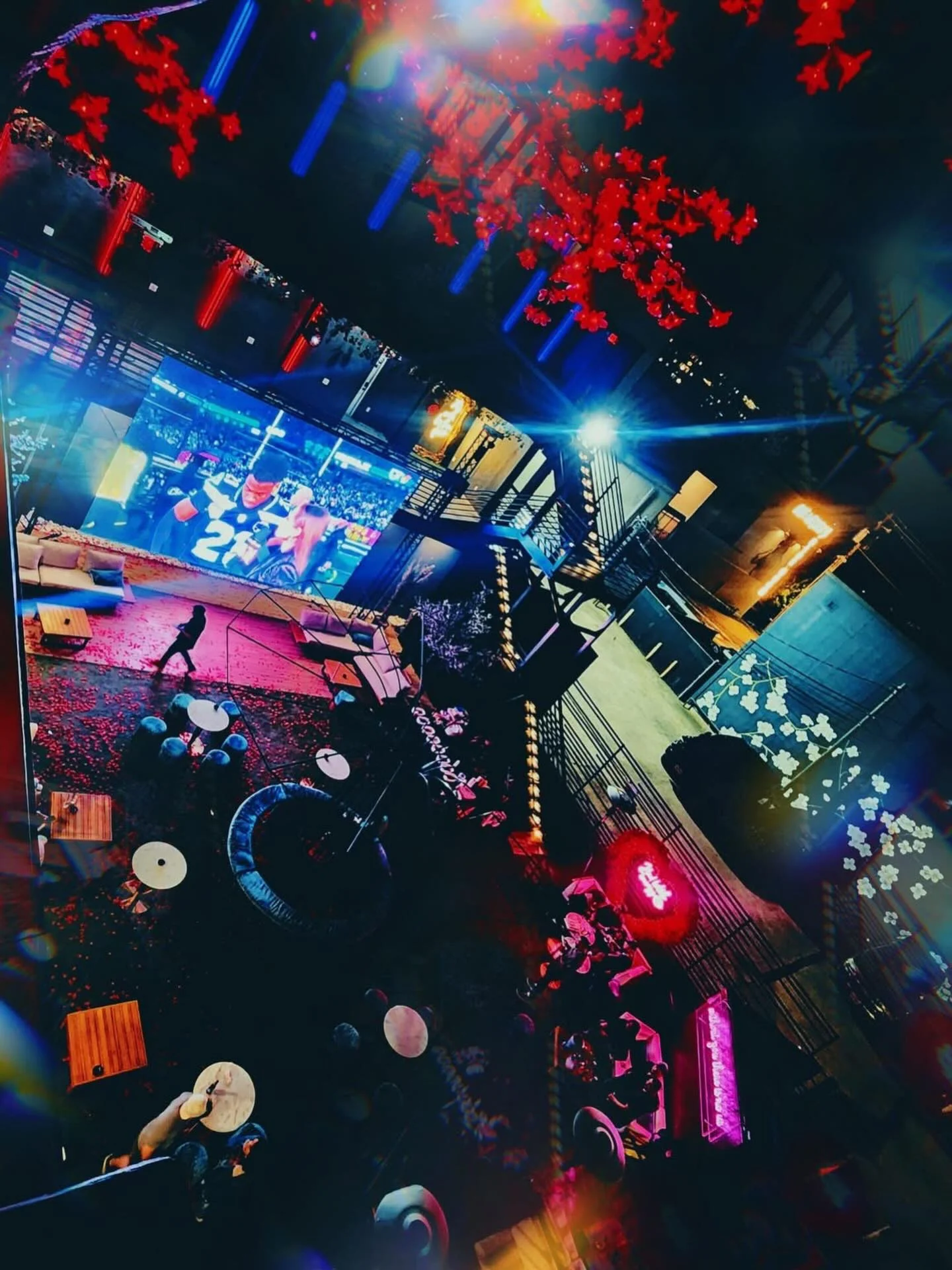 Aerial view of the rooftop with a massive LED screen at Styx + Stone