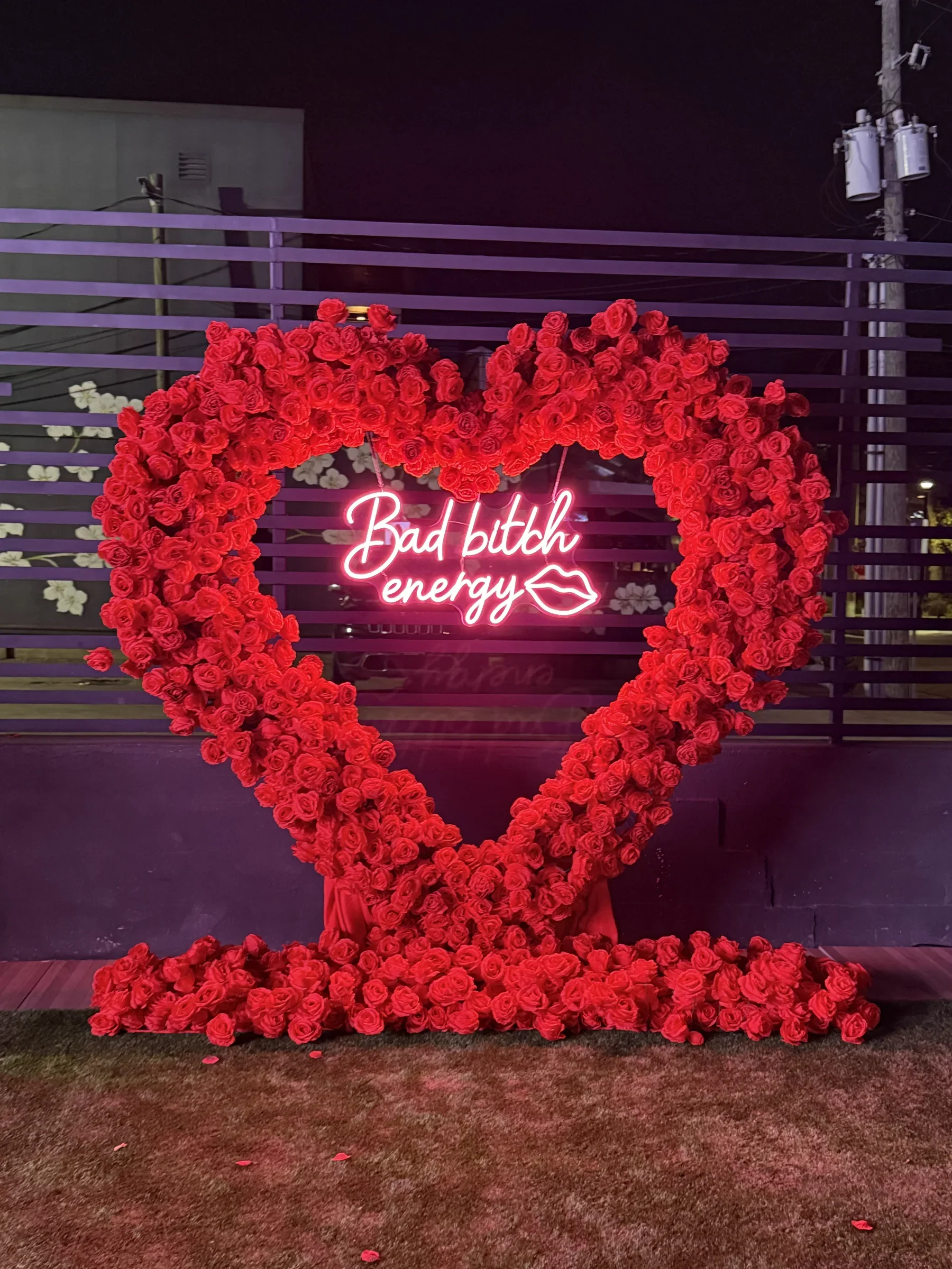 Rose heart installation with neon script at Styx + Stone