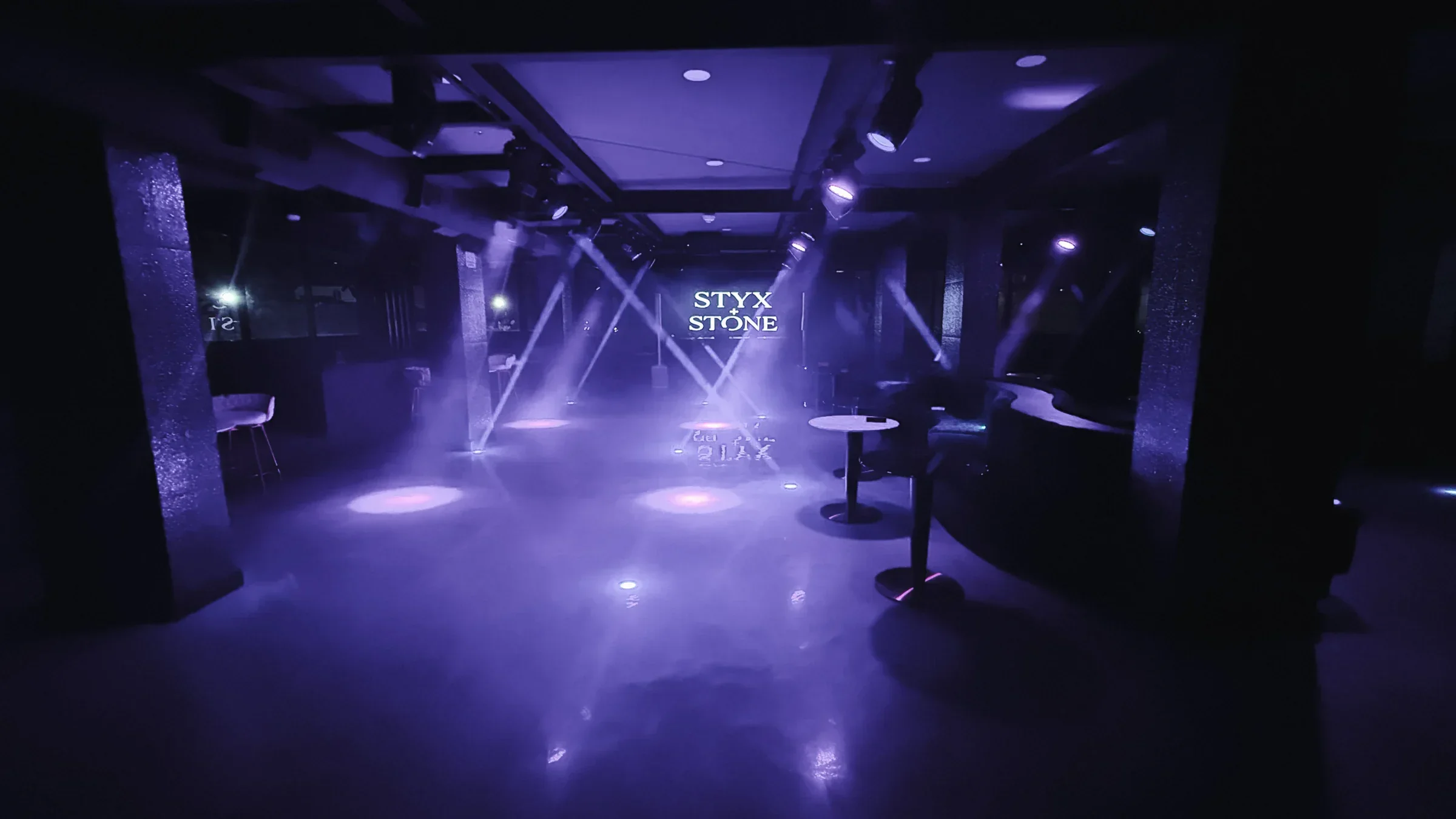 The second-floor Styx + Stone nightclub with its lighting rig firing above the dance floor